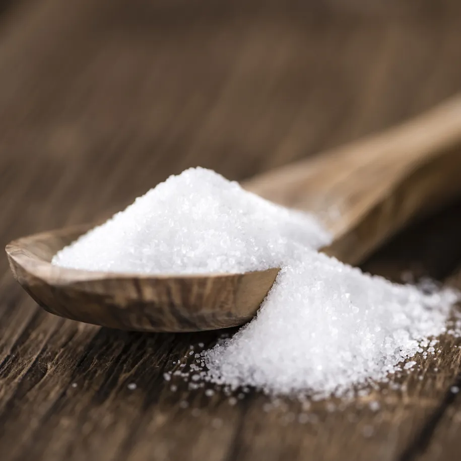 White Sugar on a spoon Eritritolo